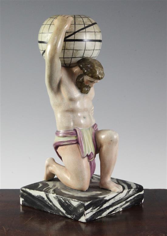 A Enoch Wood type pearlware figure of Atlas supporting a globe on his shoulder, c.1810, 24cm (9.5in.), restorations
